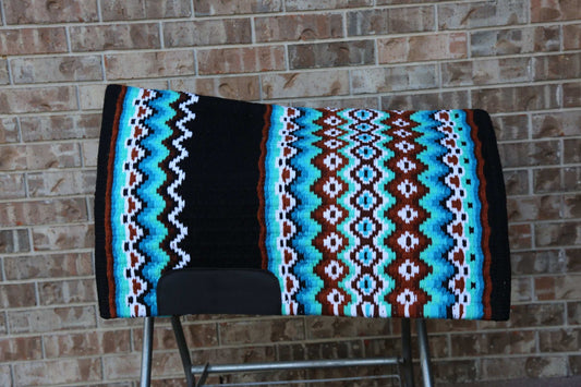 Custom Western Saddle Pad in Blue, Brown, Black on a saddle rack