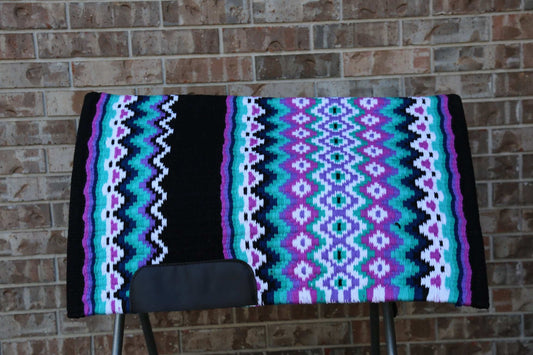 Custom Western Saddle Pad in Blue, Purple, Teal, Black geometric design and colors| Limited Edition displayed on saddle rack