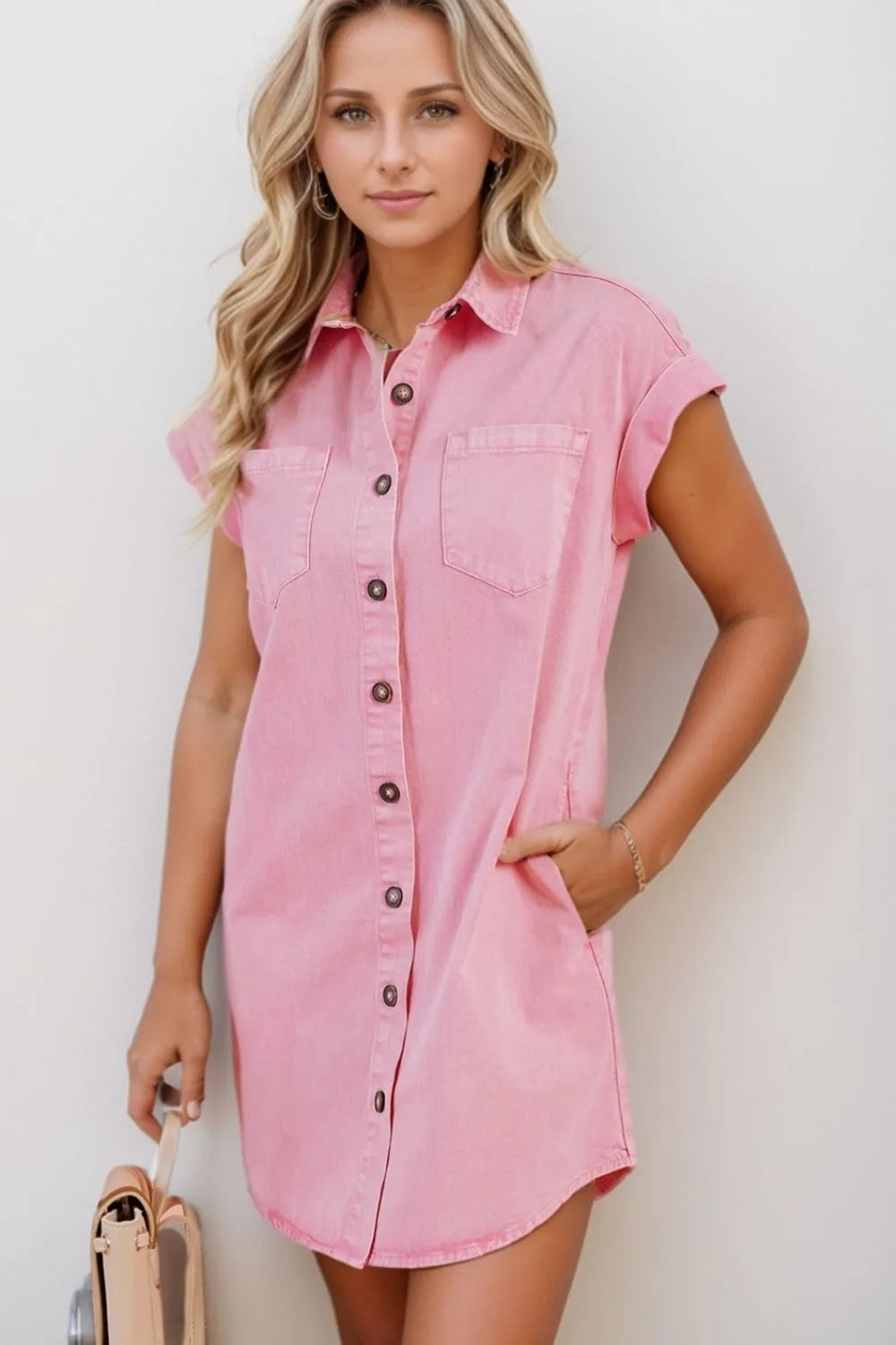 Woman wearing a Pink Button Down Short Sleeve Denim Dress
