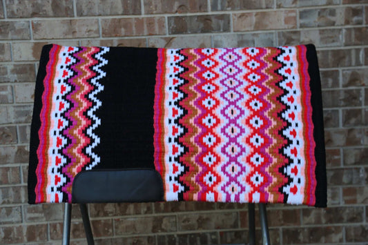 Custom Western Saddle Pad – Pink Hues and Black Details | Limited Edition displayed on saddle rack