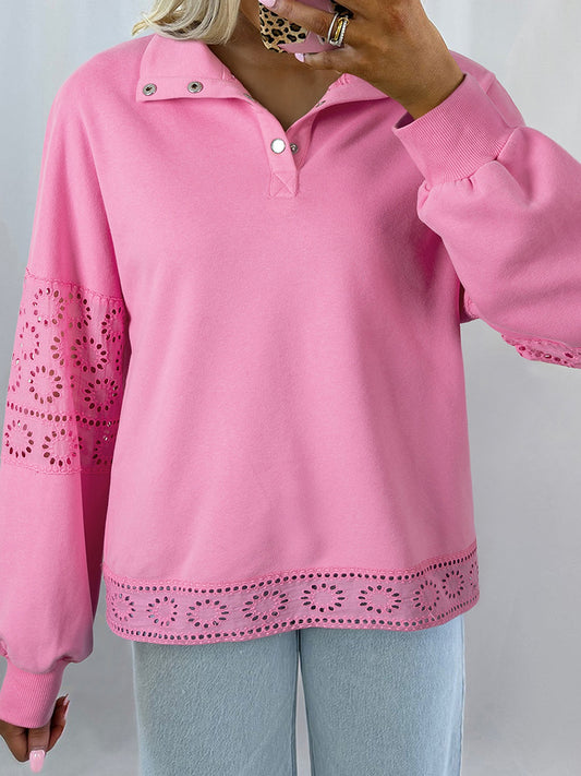 Woman wearing a pink Eyelet Lace Snap Button Sweatshirt