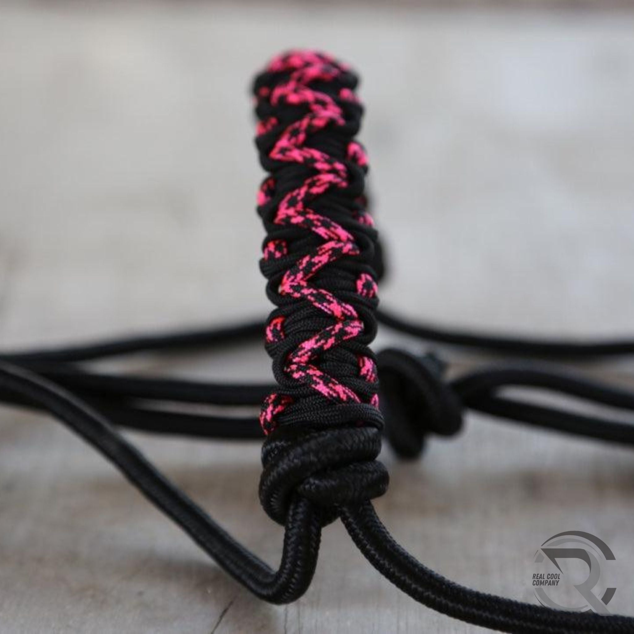 Black and pink braided noseband for a rope halter closeup